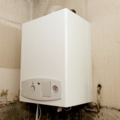 A single boiler burns gas and the heat is passed through a heat exchanger to heat the water for the central heating.